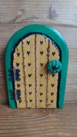 Teeny greeny fairy door with vintage button