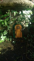 Fairy door under the toadstool